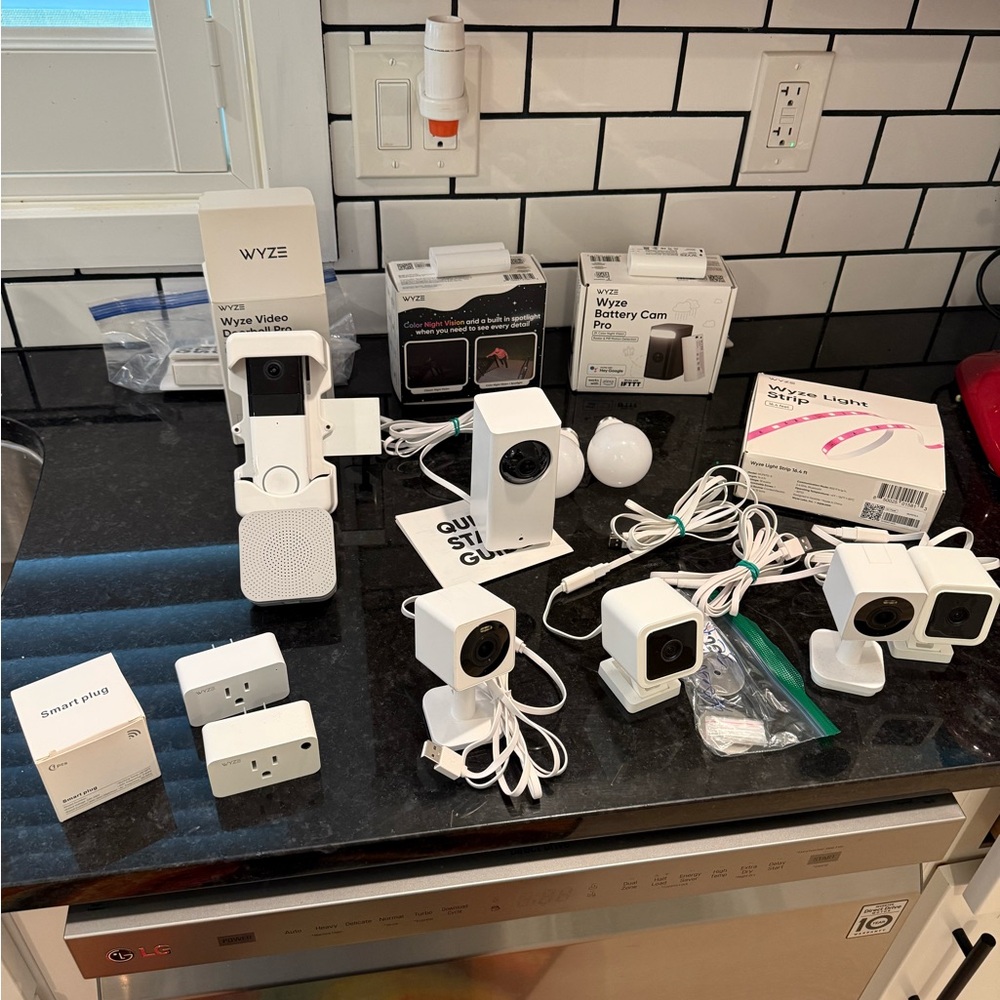 Wyze White Home Cameras (indoor & outdoor) & smart plugs- White